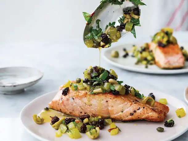 Ottolenghi’s Bridget Jones’s Pan-Fried Salmon with Pine Nut Salsa