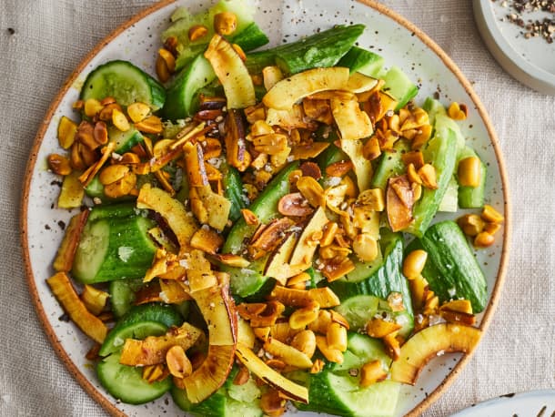 Smashed Cucumbers with Turmeric, Coconut, and Peanuts