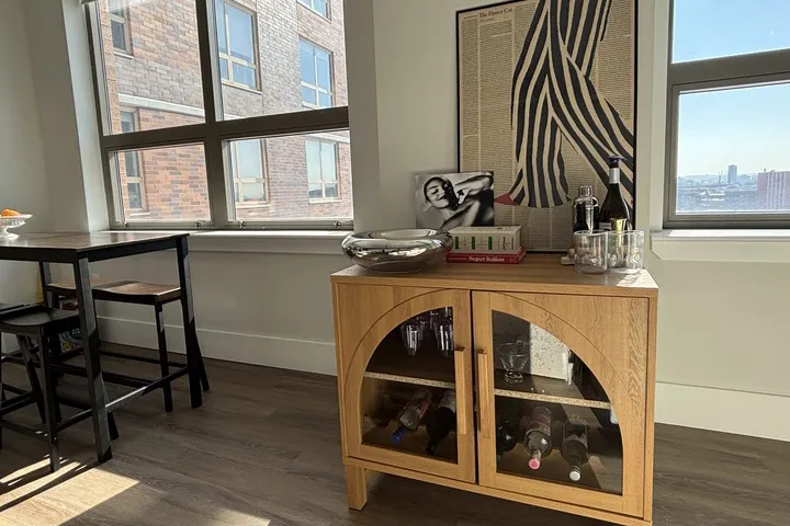 I Swapped My Old Bar Cart for This Storage-Saving Cabinet, and It Completely Transformed My Space