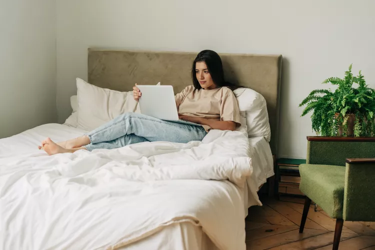 Should You Wear Outside Clothes in Bed? Experts Weigh In