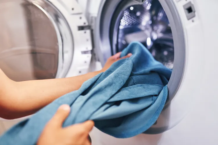 The Real Reason Your Clean Laundry Has White Residue—and 5 Ways to Fix It